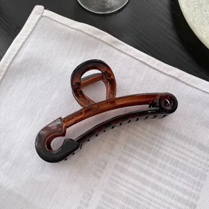 Grande pince à cheveux épingle à nourrice pour femme, griffe marron en résine élégante.