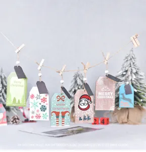 Close up detail of wooden Christmas tree hanging tags, rustic holiday wooden ornaments.