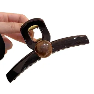 Elegante bruine haarclip met ronde kraal, stijlvolle haarklauw voor vrouwen dagelijks gebruik.