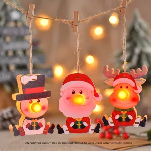 Wooden Christmas LED light-up hanging ornaments set, snowman and santa tree decor.
