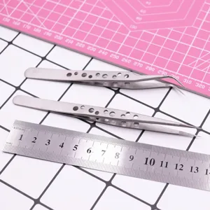 Stainless steel precision tweezers set, straight and curved tips for craft clay and model building.