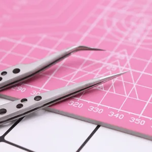 Precision craft tweezers detail view, stainless steel curved and straight tips for clay DIY.