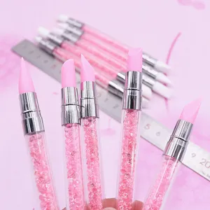 Silikon-Modellierwerkzeuge mit pinken Kristallgriffen, ideal für Tonformung und Nagelkunst.