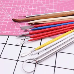 Detailed view of stainless steel polymer clay sculpting tools set for pottery craft DIY shaping.