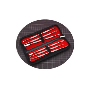 6-piece stainless steel clay carving tool set with zippered red storage case for pottery.