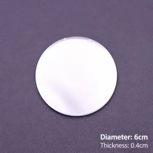 Detalle de base de acrílico transparente, forma redonda, 6 cm de diámetro, ideal para figuras y modelos.