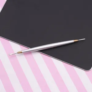 Stainless steel double ended clay sculpting and smoothing tool detail view for handmade crafts.