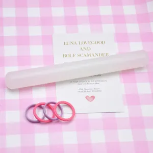 Clay rolling pin and thickness guide rings set for polymer clay and soft pottery crafts.