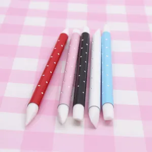 Detailed view of dual-ended silicone clay shaping sculpting tools with vibrant colorful handles.