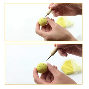 Wooden ball stylus tool detail shot, perfect for pottery clay sculpting and dotting crafts.