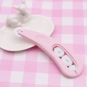 Polymer clay lace roller tool with multi-wheel design for fondant cake crafting.
