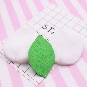 Silicone leaf mold set for fondant cake decorating and floral petal texture craft tool.