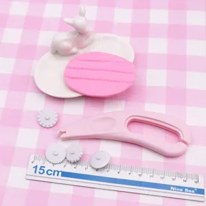 Polymer clay embossing tool set with interchangeable lace roller cutters for handmade crafts.