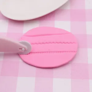 Clay embossing roller tool for fondant cake decoration and craft DIY clay making.