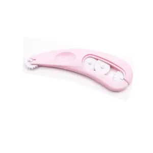 Clay lace roller detail view, pink and white plastic crafting tool for DIY fondant and modeling clay.