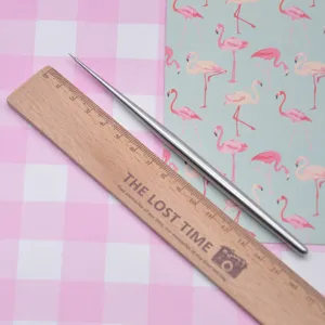 Detail view of the stainless steel sculpting tool, perfect for clay and fine crafting work.