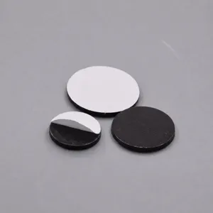 Detail shot of round rubber magnetic sheets with adhesive backing for DIY fridge magnets.
