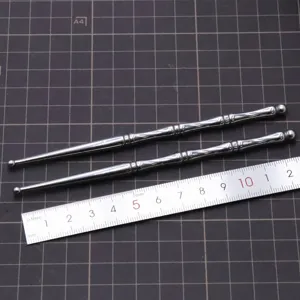 Stainless steel ball stylus tool detail shot, dual-end metal clay shaping and indentation tool.