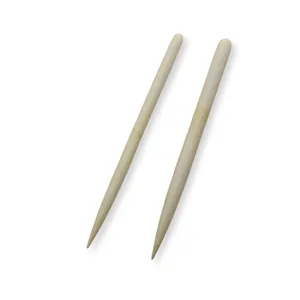 Wooden clay modeling sticks detail shot, natural bamboo smoothing tool for DIY pottery.