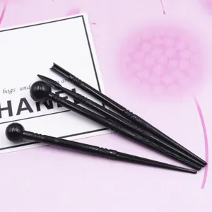 Plastic clay ball stylus tool set detail showing black shaping sticks for craft DIY projects.