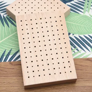 Wooden drying board skeleton with holes for polymer clay, pottery crafting and sculpture display.