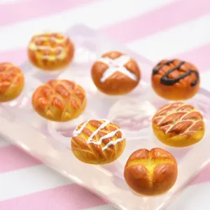 Miniature resin clay melon bun food charms close-up detail showing cute DIY silicone mold craft.