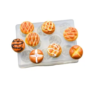 Miniature pineapple bread silicone mold and handmade clay miniature baking charms detail shot.