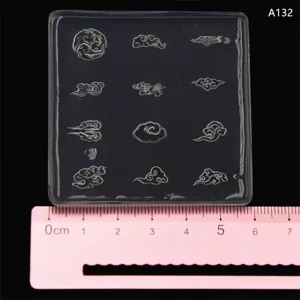 Clear silicone mold featuring various traditional cloud patterns for clay craft and resin art.