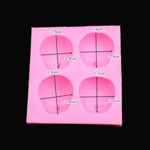 Pink BJD doll face silicone mold for polymer clay and resin crafts, cute DIY craft tool.