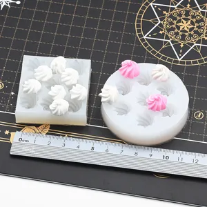 Mini cream cake silicone molds set with clay dessert pieces and measuring ruler detail view.