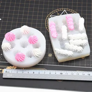 Silicone mold detail showing whipped cream clay pieces and scale ruler for DIY craft