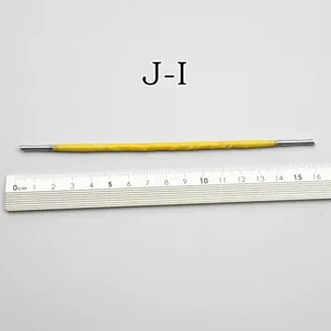 Stainless steel double-ended clay sculpting tool detail view with measurement ruler.