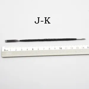 Stainless steel clay sculpting tool detail view showing double ended spatula design.