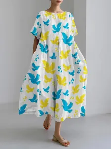 Casual loose maxi dress featuring a vibrant 3D dove and leaf print, comfortable summer wear.