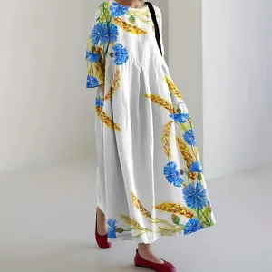 Casual long sleeve loose maxi dress featuring blue cornflower and yellow wheat prints.