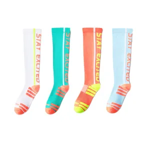 Calf compression sports socks, breathable running and fitness long socks for active women.