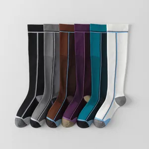 Women sports compression calf socks detail, featuring multiple color for running fitness training.
