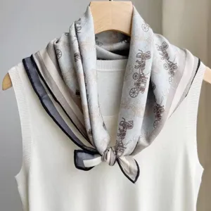 Detailed view of women's carriage pattern square scarf elegant accessory spring and autumn chic shawl