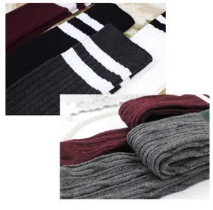 Detailed close-up of women over-the-knee socks, cable knit and striped student long socks.