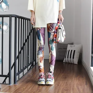 Detailed shot of women's graffiti printed leggings showcasing colorful abstract pattern design.