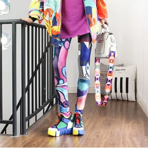 Vibrant abstract printed women's leggings, colorful streetwear graffiti long pants for autumn.
