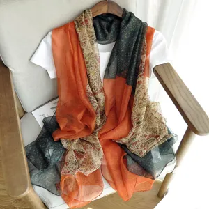 Lightweight sheer silk scarf and beach sun protection shawl for women, perfect for summer styling.