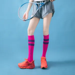 Women athletic compression socks professional running long tube fitness sports socks detail view.