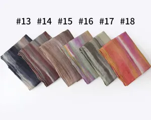 Detailed view of lightweight crinkle tie-dye striped scarves in multi colors for summer wear.