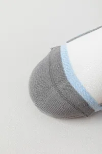 Close-up detail of athletic compression socks for women running fitness sports lifestyle wear.