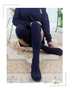 Cable knit over-the-knee socks for women, vertical stripes, comfortable long winter socks detail.