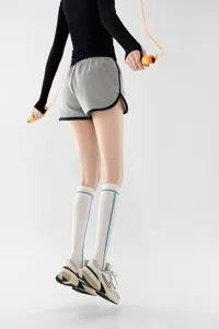 Professional sports compression calf socks for women, running fitness and cycling long socks.
