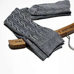 Grey cable knit over-the-knee socks for women, cozy winter long stockings, casual style.