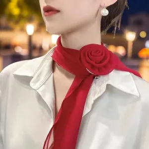 Red rose chiffon scarf detail view, lightweight elegant neck accessory for women.