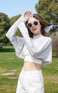 Close-up detail of lightweight breathable sun protection bolero sleeve jacket for women outdoor.